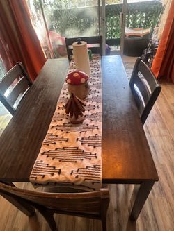 Wooden Dinner table and Chairs!!!! Solid for small family