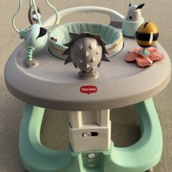 Selling a Tiny Love activity center.