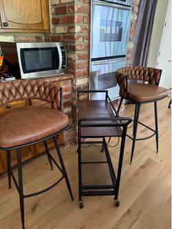2 barstools and bar cart