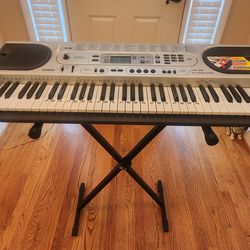 Casio LK-45 Keyboard 61Lighted Keys with Stand & Power Cord, Tested