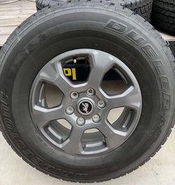 (406) 2022 Ford Bronco take off wheels/tires. Bridgestone dueler 255/75/17 (Set Of 2 ONLY)