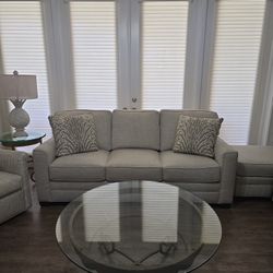 Couch With Decorative Pillows And Ottoman