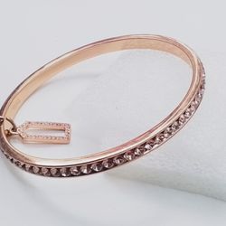 COACH ROSE GOLD TONE BANGLE BRACELET 