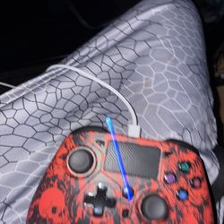 wireless Bluetooth gamepad controller designed for PS4, PS3, PC, iOS, and Android devices.