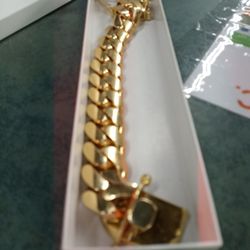 Brand New ,305 Grams Of 10 K Gold,10 Inch Long 1 Inch Wide .Availability Questions Will Be Ignored,Low Offers Same. Serious Inquiry . 