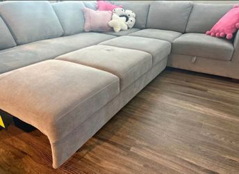 Gray sectional couch w chaise lounge and storage