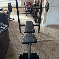 Exercise bench - with bar and weights