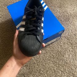 Black Adidas Superstars