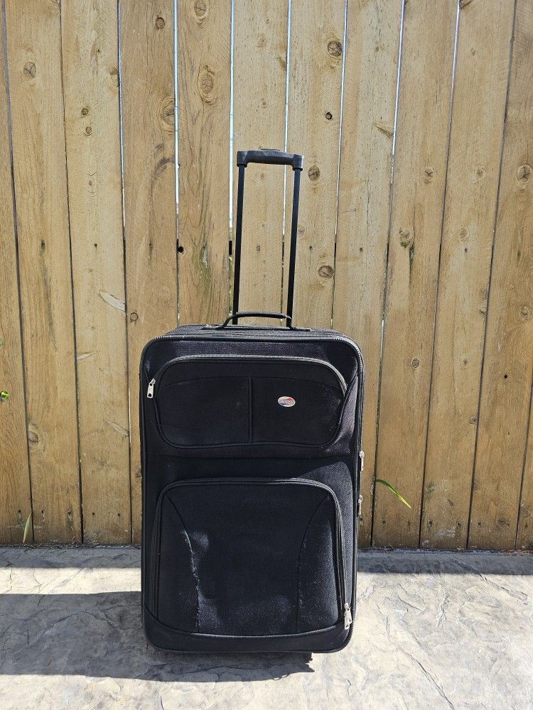 suitcase/ luggage