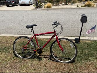 Bright red bike (adult)