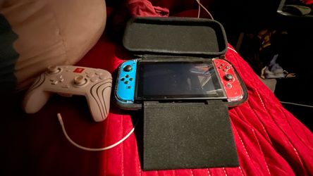 Nintendo Switch with Case and Controller