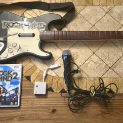 Wii Rockband Guitar, Microphone and Rockband 2 Game. Includes Dongle And strap. Just Played It. 