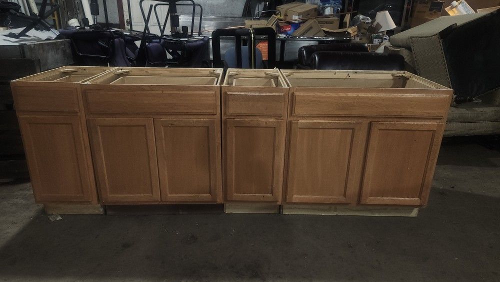 Four piece lower kitchen cabinet set used