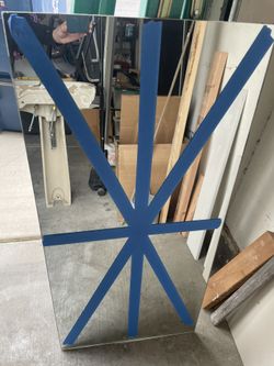 Bathroom Mirror Photo Shows It Taped As It Was Taped For Removal- $100 Value At Home Depot