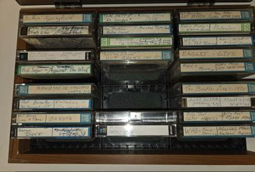 Vintage Cassette Tape Collection in Storage Case