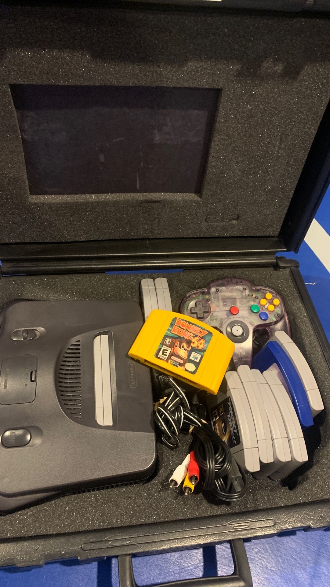 Nintendo 64 with case and 9 games including Donkey Kong (DK), banjo kazooie, Mario kart and more