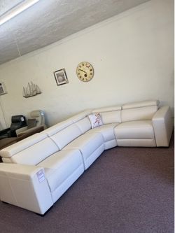 Nevio-4 pc leather sectional with two power recliners