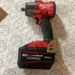Milwaukee impact 1/2 inch with battery HD 12 New 