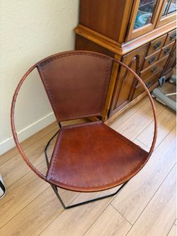 Round leather accent chair