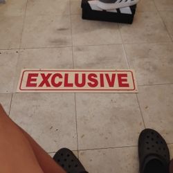 Exclusive Sign