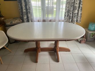 Corian 6’ Kitchen Table with Leaf and 6 swivel chairs