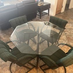 Glass Table With Green Chairs 