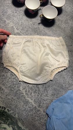 vintage baby bloomers (or diaper covers) from around the 1960s.