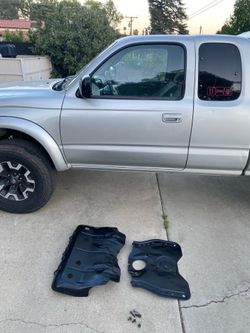 Toyota stock skid plates 1st gen Tacoma 3rd gen & bolts $150 cash 2401 n  Euclid ave Upland 91784