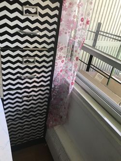 Styled black and white file cabinet