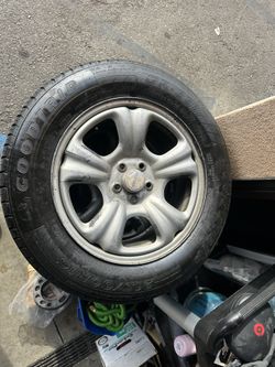 Rim And Tires 215/ 60/ 16