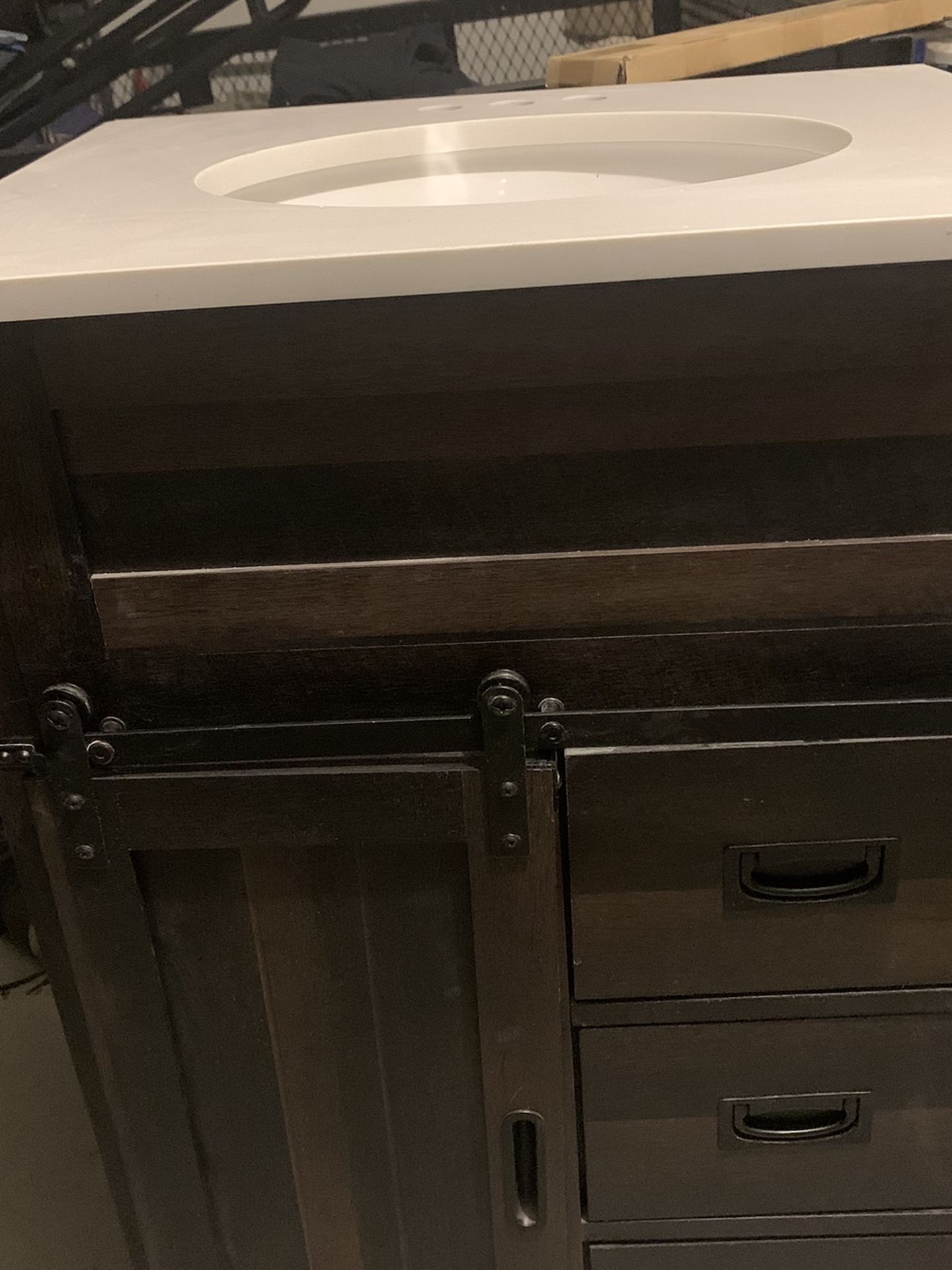 Bathroom cabinet with top sink