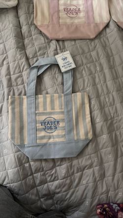 Baby blue Trader Joe’s bag