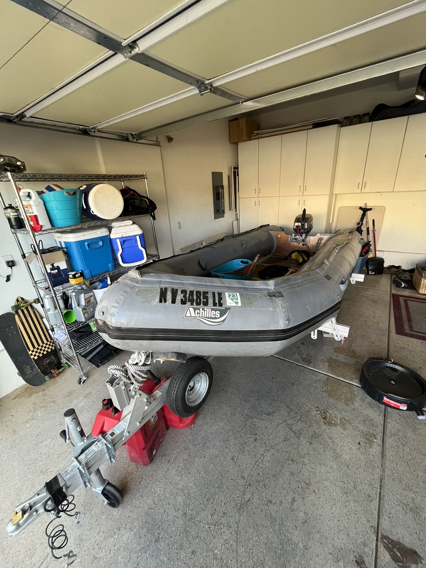 Achilles Zodiac Inflatable Boat With Johnson 15 Motor And Trailer