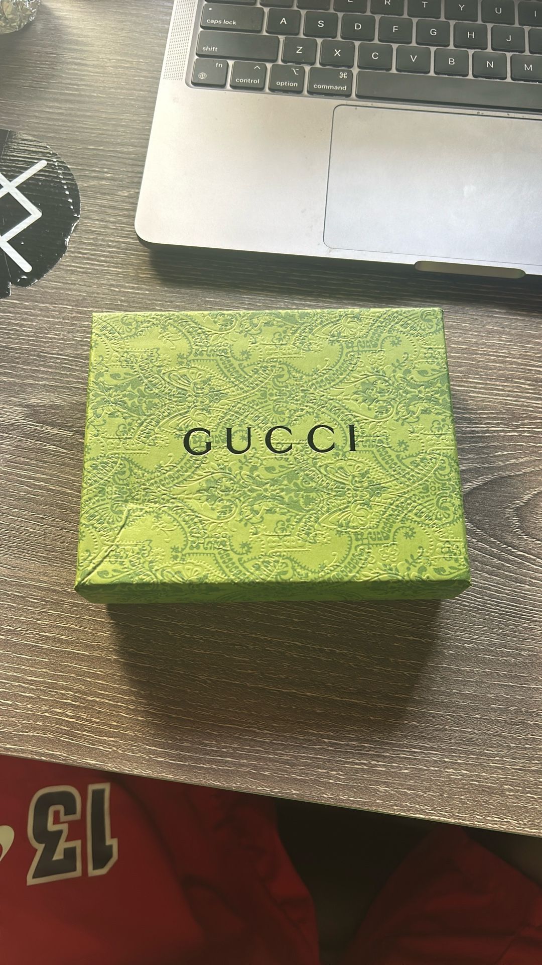 Gucci mens bi fold black leather wallet