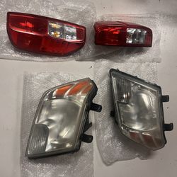 2016 Nissan Frontier OEM Headlights And Taillights