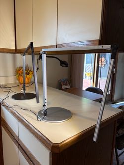 Two used KONCEPT  bar desk lamps