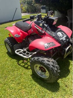 2005 red Honda 300