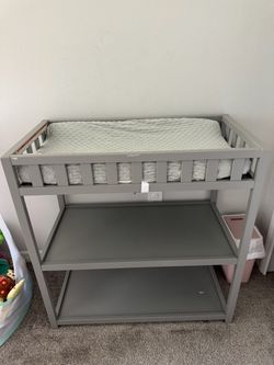 Gray changing table