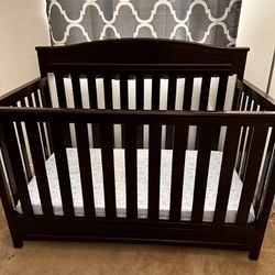 Delta Emery 4-in-1 Convertible Baby Crib