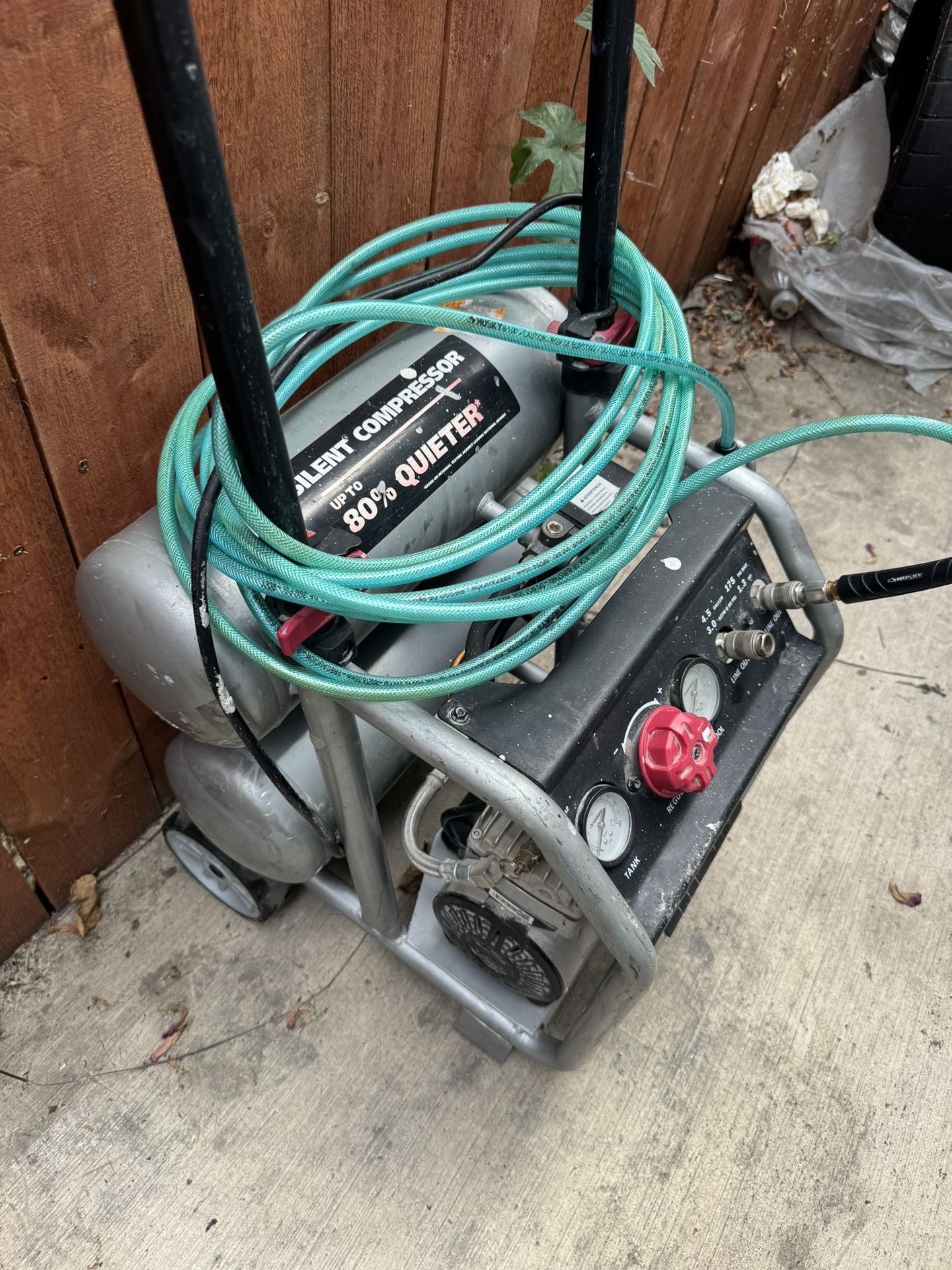 Used Husky - 4.5 Gal. 175 PSI Portable Electric Oil-Free Air Compressor with husky hose.