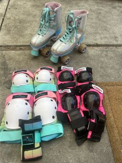 Skates & 2 sets of knee, elbow and wrist gear.