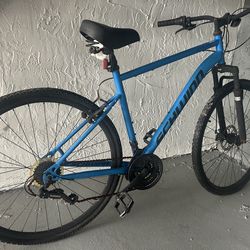 Schwinn Copeland Hybrid Bike with 700c wheels.