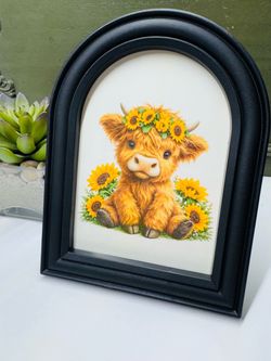 Whimsical highland cow with sunflowers picture