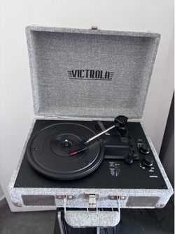 Record player with vinyl records