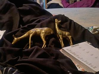 Brass deer and giraffe
