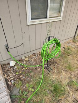 Garden Hose with Floor Staked Holder
