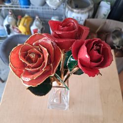 Real roses dipped in resin and painted with 24k gold