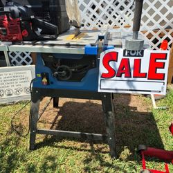 Table Saw, Chain Saw, and Jack