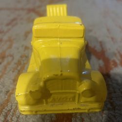Yellow vintage AVON aftershave car bottle