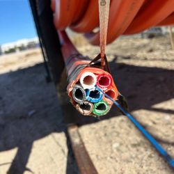 Half Used Roll Of Orange Conduit HDPE Piping